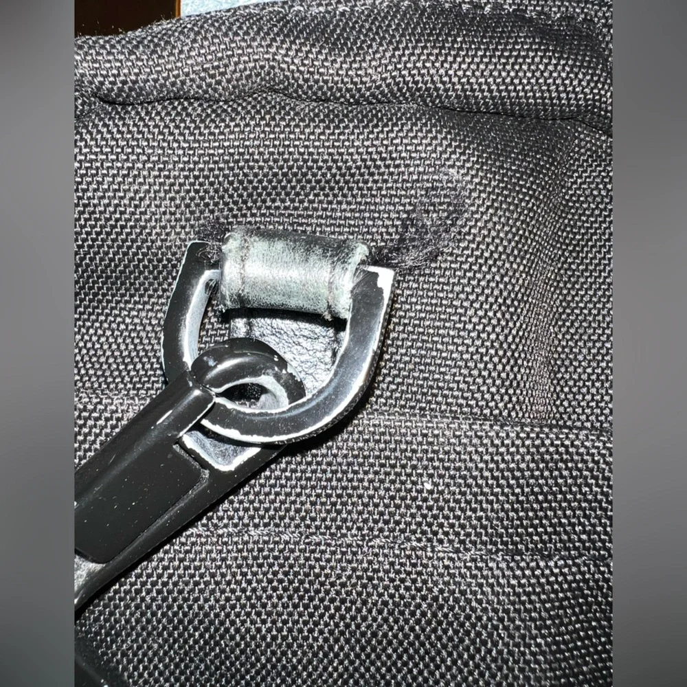 KNOMO Black Unisex Laptop Briefcase Messenger Bag with many compartments.